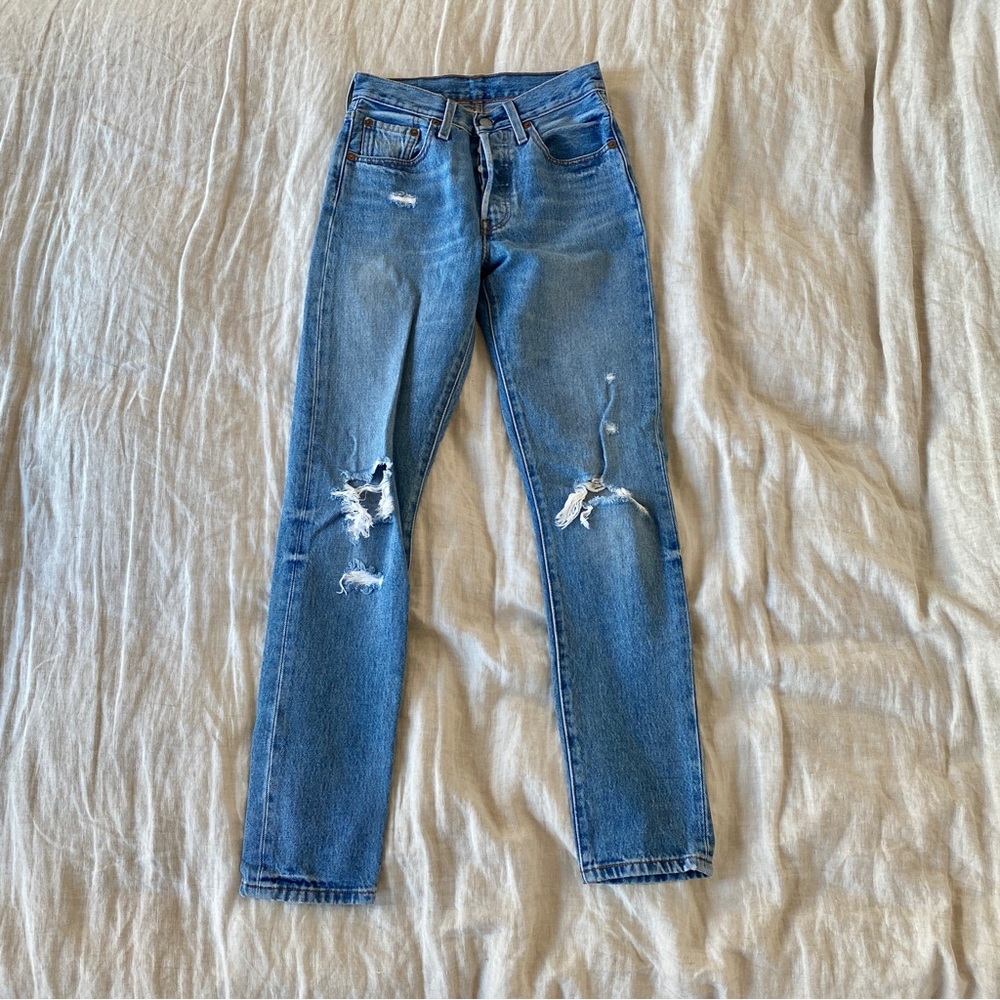 Levi’s 501 Medium Wash Distressed Denim